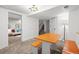 Finished basement featuring carpeting, bench seating, and access to a secondary seating area for added comfort at 435 Balsam St, Lakewood, CO 80226