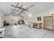 A spacious garage interior, offering ample room for storage, a workshop area, and fitness equipment at 435 Balsam St, Lakewood, CO 80226