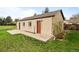 Side view of the detached garage or outbuilding with multiple entrances and a clean, modern design at 435 Balsam St, Lakewood, CO 80226