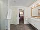 Modern bathroom with sleek vanity, glass-enclosed shower, and stylish fixtures for a spa-like experience at 4432 Umatilla St, Denver, CO 80211