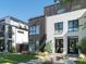 Well-maintained modern home with lush lawn and inviting walkway at 4432 Umatilla St, Denver, CO 80211