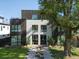 Striking modern home with dual front entrances and elegant landscaping at 4432 Umatilla St, Denver, CO 80211