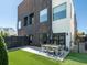 Beautiful two-story home showcases modern design, ample windows, and a well-manicured backyard at 4432 Umatilla St, Denver, CO 80211