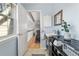 Bathroom with bright blue walls and a window for natural light, plus modern vanity and decor at 1929 S Xanadu Way, Aurora, CO 80014