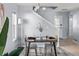 Stylish dining area features contemporary decor and natural light from the window at 1929 S Xanadu Way, Aurora, CO 80014