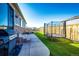 Backyard with gas grill, fire pit, patio, and trampoline for outdoor entertainment at 469 S Olathe St, Aurora, CO 80017