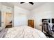Comfortable bedroom featuring carpeted floors, a ceiling fan, and a closet at 469 S Olathe St, Aurora, CO 80017