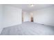 Comfortable bedroom includes carpet and leads to ensuite bathroom, providing convenience and privacy at 22133 E 38Th Pl, Aurora, CO 80019