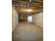 Unfinished basement featuring wrapped walls and exposed ceiling at 418 Grey Rock St, Brighton, CO 80601