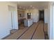 Open concept kitchen featuring an island, modern cabinets, and recessed lighting at 418 Grey Rock St, Brighton, CO 80601