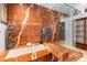 Lavish bathroom offering a marble-finished soaking tub and a glass shower enclosure at 400 S Steele St # 64, Denver, CO 80209