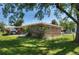 Expansive backyard showcasing a well-maintained lawn, patio area, and a glimpse of the home's exterior at 855 33Rd St, Boulder, CO 80303