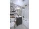 Charming bathroom features modern fixtures, a stylish vanity, and a shower-tub combination at 855 33Rd St, Boulder, CO 80303