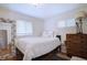 Bright bedroom with a comfortable bed, natural light, and classic wooden furniture at 855 33Rd St, Boulder, CO 80303