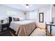 Inviting bedroom features a cozy bed, plush bedding, and elegant decor at 855 33Rd St, Boulder, CO 80303