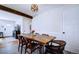 Inviting dining area with a rustic wooden table, comfortable chairs, and modern lighting fixtures for gatherings at 855 33Rd St, Boulder, CO 80303