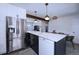 Updated kitchen with a large island, stainless steel appliances, and stylish fixtures at 855 33Rd St, Boulder, CO 80303