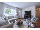 Comfortable living room with a large window, plush sofa, and stylish decor, creating a warm and inviting space at 855 33Rd St, Boulder, CO 80303