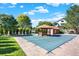 Community pool area surrounded by greenery at 3030 W Prentice Ave # D, Littleton, CO 80123