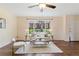 Cozy living room with large picture window that lets in lots of natural light at 12708 W Virginia Ave, Lakewood, CO 80228