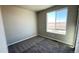 Cozy bedroom with large window and closet space at 2263 Serenidad St, Brighton, CO 80601