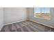 Bedroom with carpet and a view of outside from the window at 2263 Serenidad St, Brighton, CO 80601