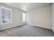 Cozy bedroom with neutral walls, plush carpet, and ample natural light at 2263 Serenidad St, Brighton, CO 80601