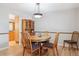 Dining room features hardwood floors and a wood table and chairs at 7351 S Sheridan Ct, Littleton, CO 80128