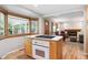 Open concept kitchen with white appliances that overlooks the living room at 7351 S Sheridan Ct, Littleton, CO 80128