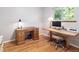 Home office with hardwood floors, lots of light, and featuring two nice desks at 7351 S Sheridan Ct, Littleton, CO 80128