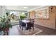 Sunroom with lots of natural light and space for a dining table and chairs at 7351 S Sheridan Ct, Littleton, CO 80128