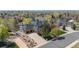 Aerial view showcases a home with a three-car garage, and lush landscaping at 3 White Pelican Cir, Thornton, CO 80241