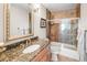 Elegant bathroom features granite countertops, a modern shower, and ample lighting at 3 White Pelican Cir, Thornton, CO 80241