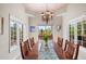Formal dining room featuring a beautiful view and seating for multiple guests at 3 White Pelican Cir, Thornton, CO 80241