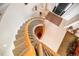 Elegant foyer with spiral staircase and a view of the front door at 3 White Pelican Cir, Thornton, CO 80241