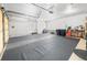 Large and tidy garage provides ample room for vehicles and storage at 3 White Pelican Cir, Thornton, CO 80241