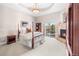 Main bedroom with a fireplace and access to a balcony at 3 White Pelican Cir, Thornton, CO 80241