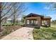 Scenic community park with a covered pavilion and picturesque lake backdrop at 3 White Pelican Cir, Thornton, CO 80241