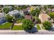 Aerial view of a well-landscaped yard, highlighting privacy fencing and neighborhood streets, creating a sense of community at 6260 E 114Th Ave, Thornton, CO 80233