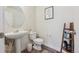 Cozy powder bathroom with modern fixtures and decorative accents at 6260 E 114Th Ave, Thornton, CO 80233