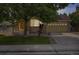 A cozy home featuring a stone facade, well-manicured lawn, and a two-car garage at 6260 E 114Th Ave, Thornton, CO 80233