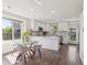 Eat-in kitchen with stainless appliances and a view of the backyard at 6260 E 114Th Ave, Thornton, CO 80233