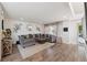 Stylish living room with hardwood floors, neutral tones, and elegant decor, creating a welcoming and comfortable space at 6260 E 114Th Ave, Thornton, CO 80233