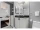 Modern bathroom featuring a vanity with sleek hardware and a view to the bedroom at 720 16Th St # 311, Denver, CO 80202