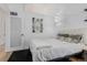 Cozy bedroom with a comfortable bed, soft lighting, and a door at 720 16Th St # 311, Denver, CO 80202