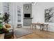 Inviting living room featuring hardwood floors, stylish decor, and large windows offering ample natural light at 720 16Th St # 311, Denver, CO 80202