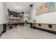 Spacious lobby area with modern artwork and comfortable seating at 720 16Th St # 311, Denver, CO 80202