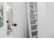 Hall closet with shelving and ladder at 720 16Th St # 311, Denver, CO 80202