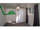 A simply decorated bedroom with carpet and geometric wall design at 2605 Crabapple Ct, Golden, CO 80401
