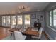 Inviting dining room with natural light, a modern light fixture, and seating for six at 2605 Crabapple Ct, Golden, CO 80401